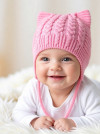 Вязаная однослойная шапочка с завязками фото 3 &mdash; MamaEmma.ru