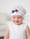 Детская шапка для девочки до года Pupill Coco летняя фото 4 &mdash; MamaEmma.ru